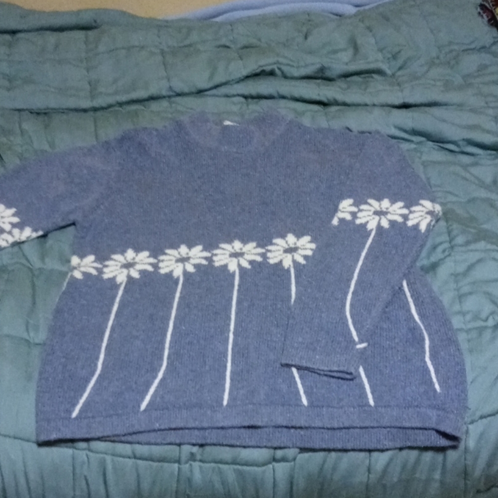 White flower blue sweater
